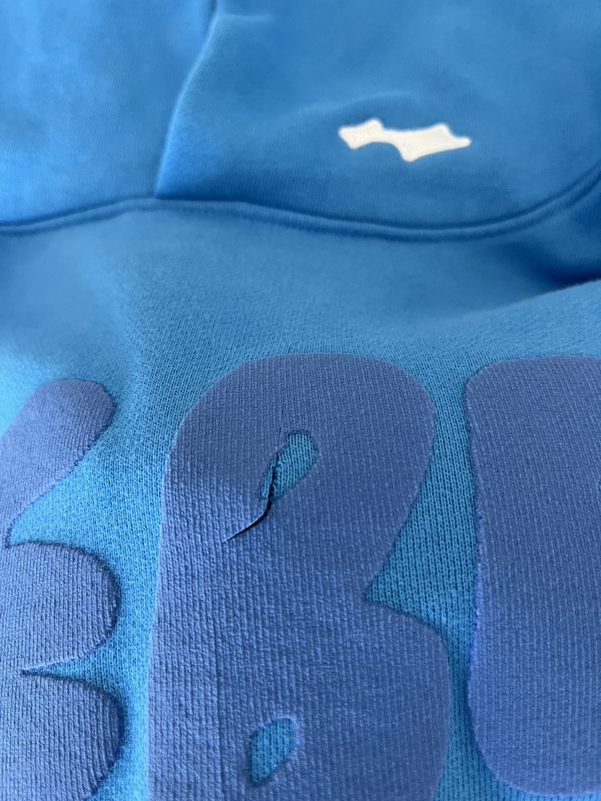 Justin Bieber Official Coachella 2026 Blue Bieber Hoodie Small DAMAGED with Cut gallery