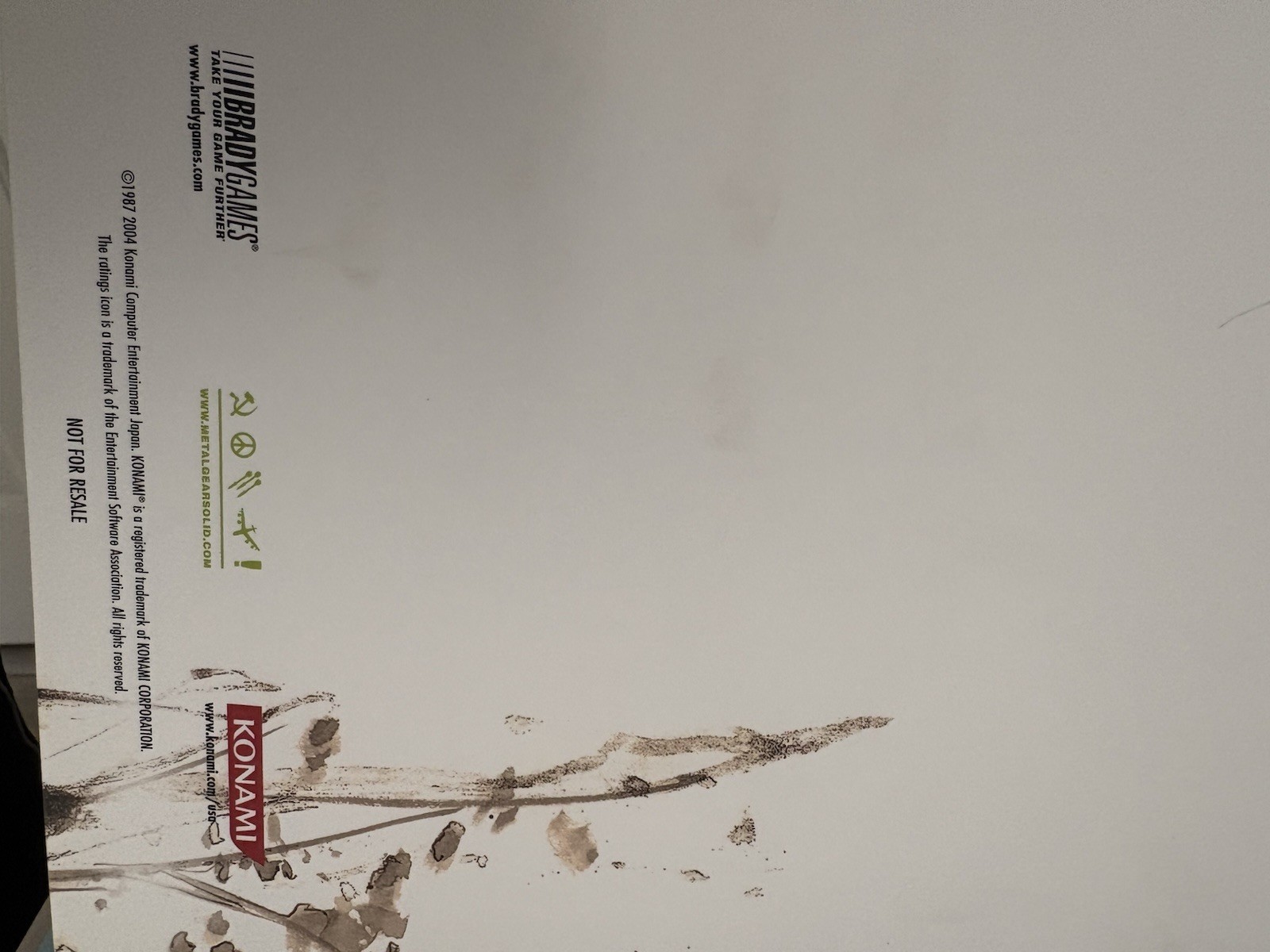 Metal Gear Solid collector lot with Uniqlo 25th Anniversary shirt gallery