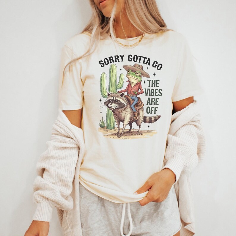 Cowboy Frog Riding Raccoon Sorry Gotta Comfort Tee Funny Meme gallery
