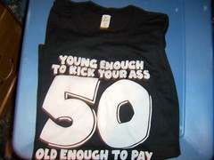 NWOT JT-SWING Black “50” YOUNG ENOUGH TO KICK YOUR A44 T-Shirt – SIZE XL