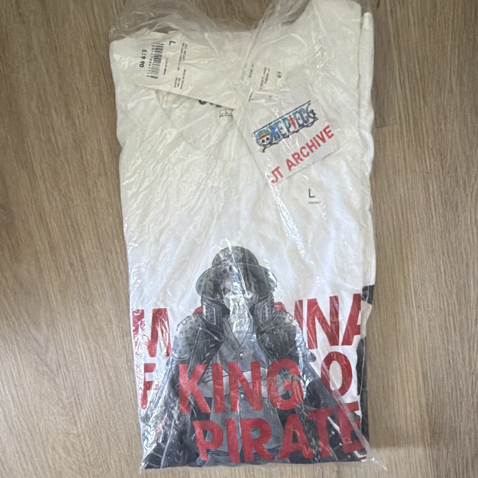 Uniqlo UT Archive One Piece Men's White Graphic Print Crew Neck T-Shirt L gallery