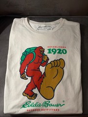Eddie Bauer Sasquatch t-shirt features a red bigfoot graphic with a g