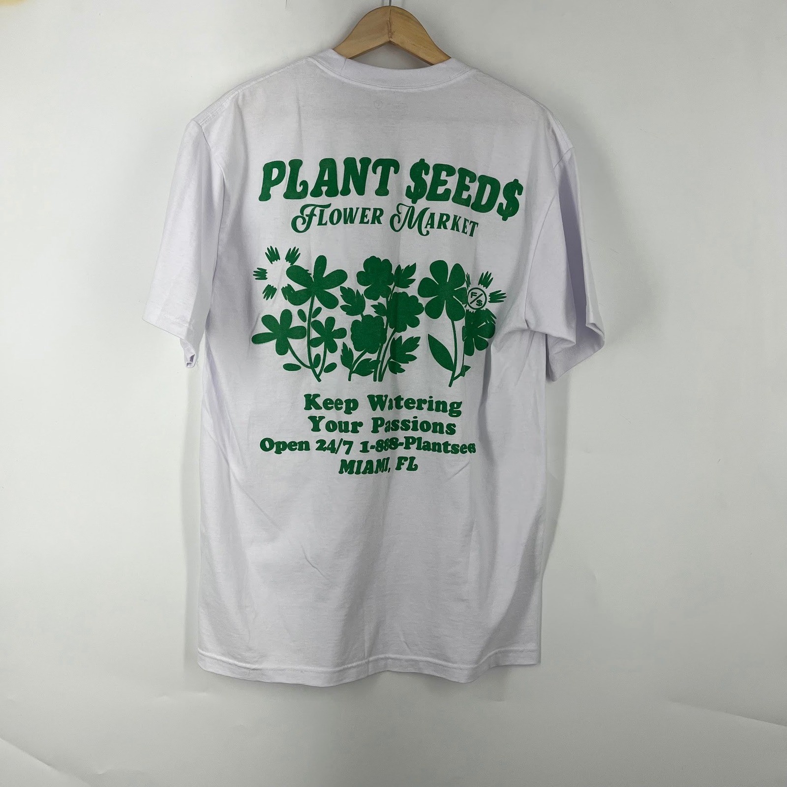 Fly Supply See The Good Plant Seeds Flower Market Miami FL Graphic T-Shirt Large gallery