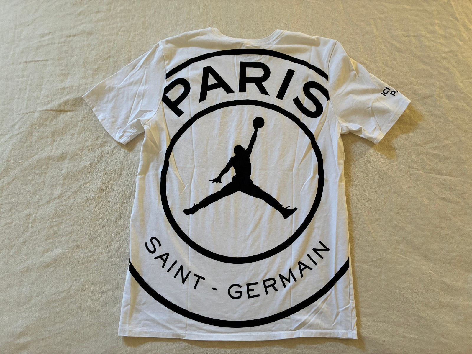 Nike Air Jordan Paris Saint-Germain Men’s PSG White Graphic T-Shirt, Size - L gallery