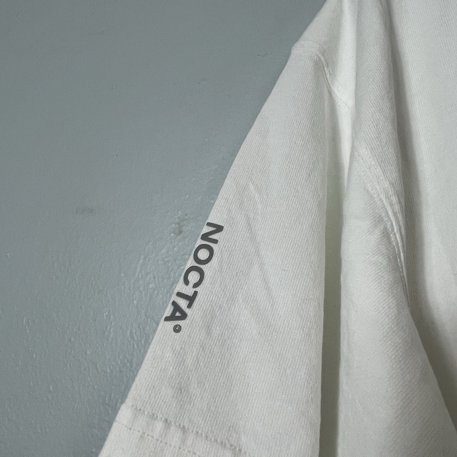 Nike x Drake NOCTA Cardinal Stock White Tee Shirt Large Logo gallery