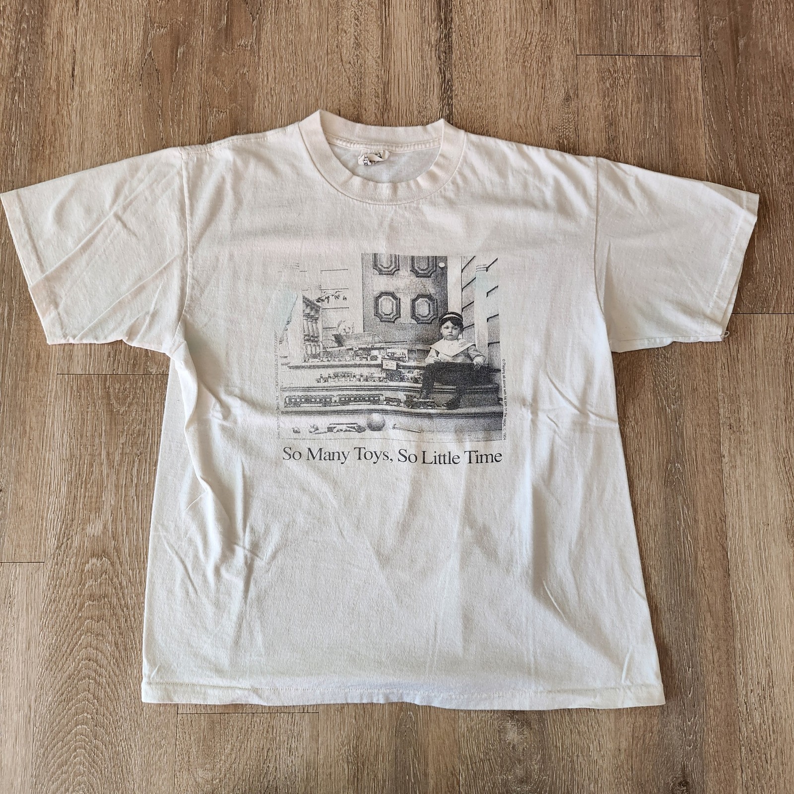 Vintage 90s So Many Toys So Little Time Tshirt Size L Cream White gallery