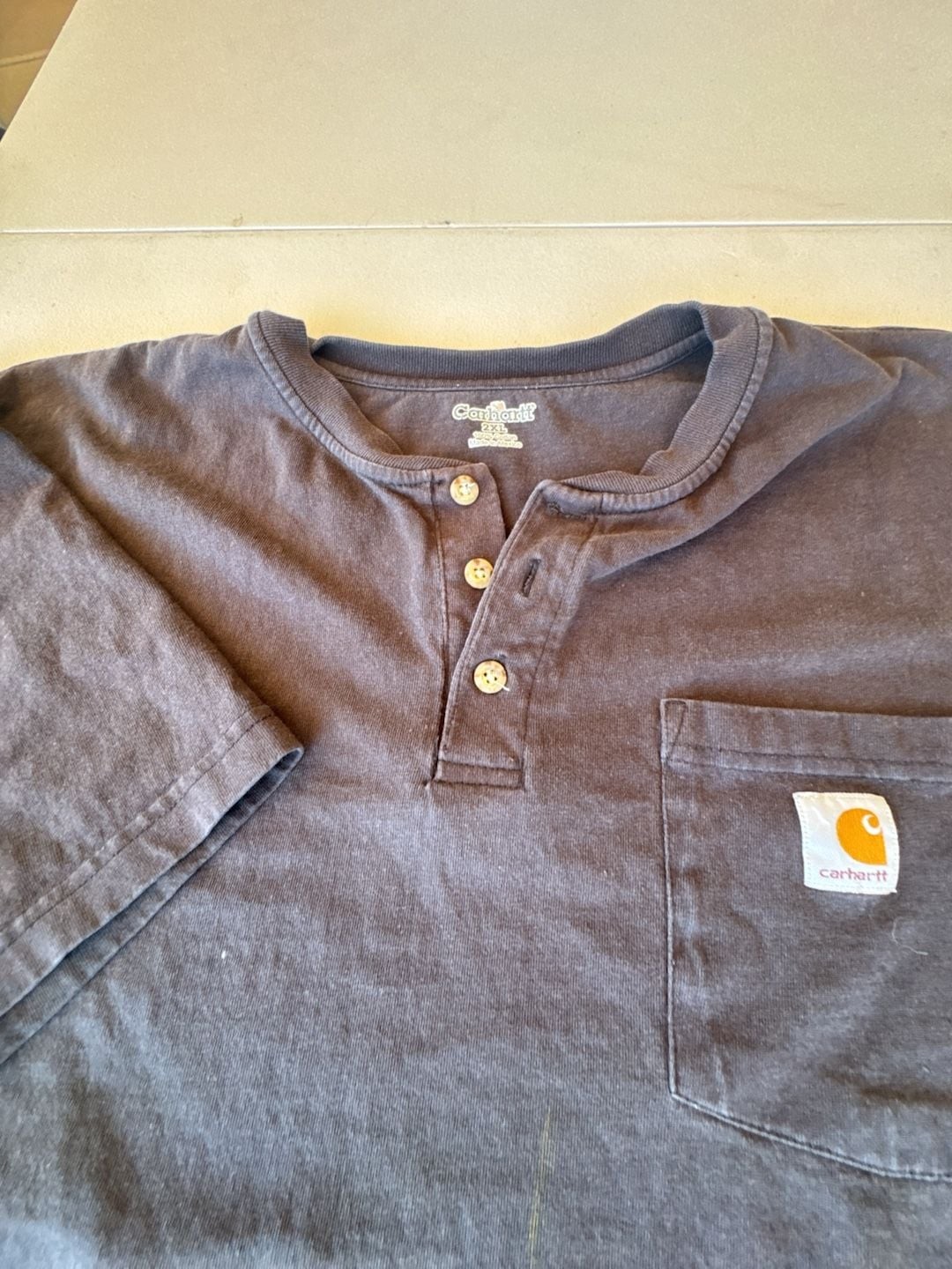 Carhartt K84 Workwear Loose Fit Short-Sleeve Henley T-Shirt with Pocket. Used bu gallery