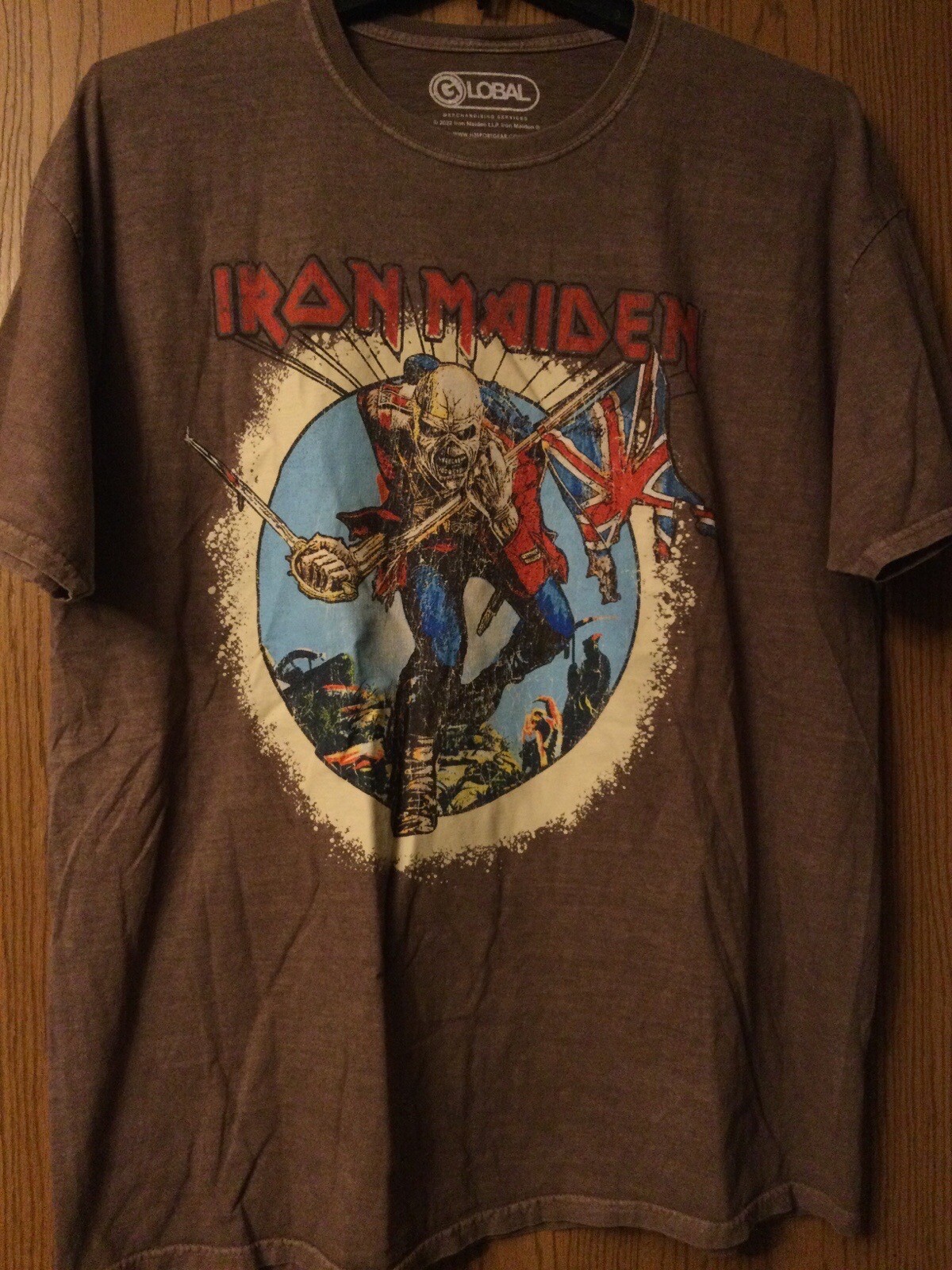 Iron Maiden – Eddie Holding British Flag – 2022 Brown Shirt – 0X/1X – Global