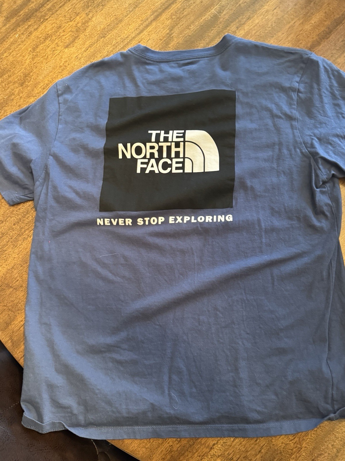 The North Face Short Sleeve Tshirt Never Worn Blue And Black. gallery