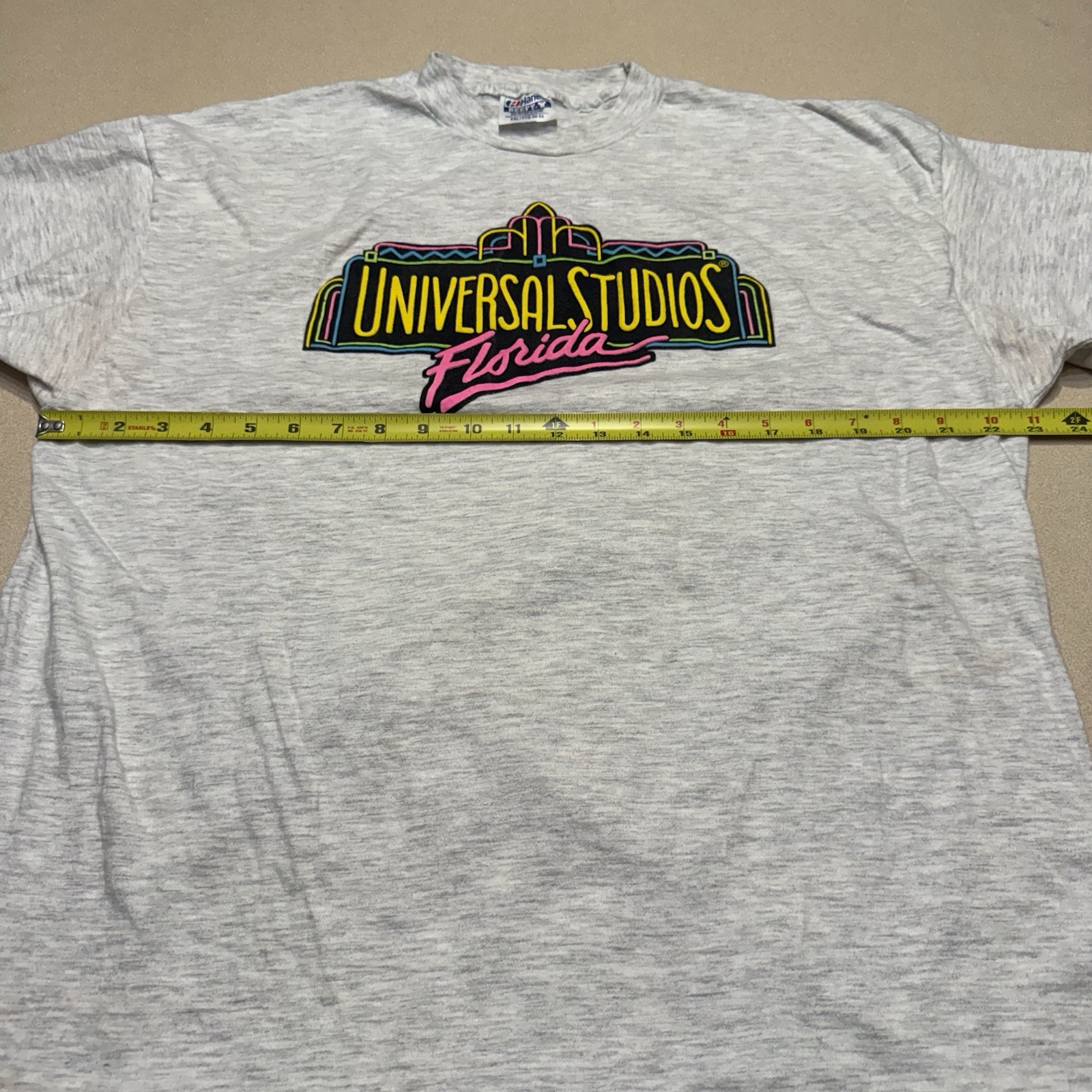 Vintage 90s UNIVERSAL STUDIOS FLORIDA NEON Beefy T-shirt See Pics Spots XXL USA gallery