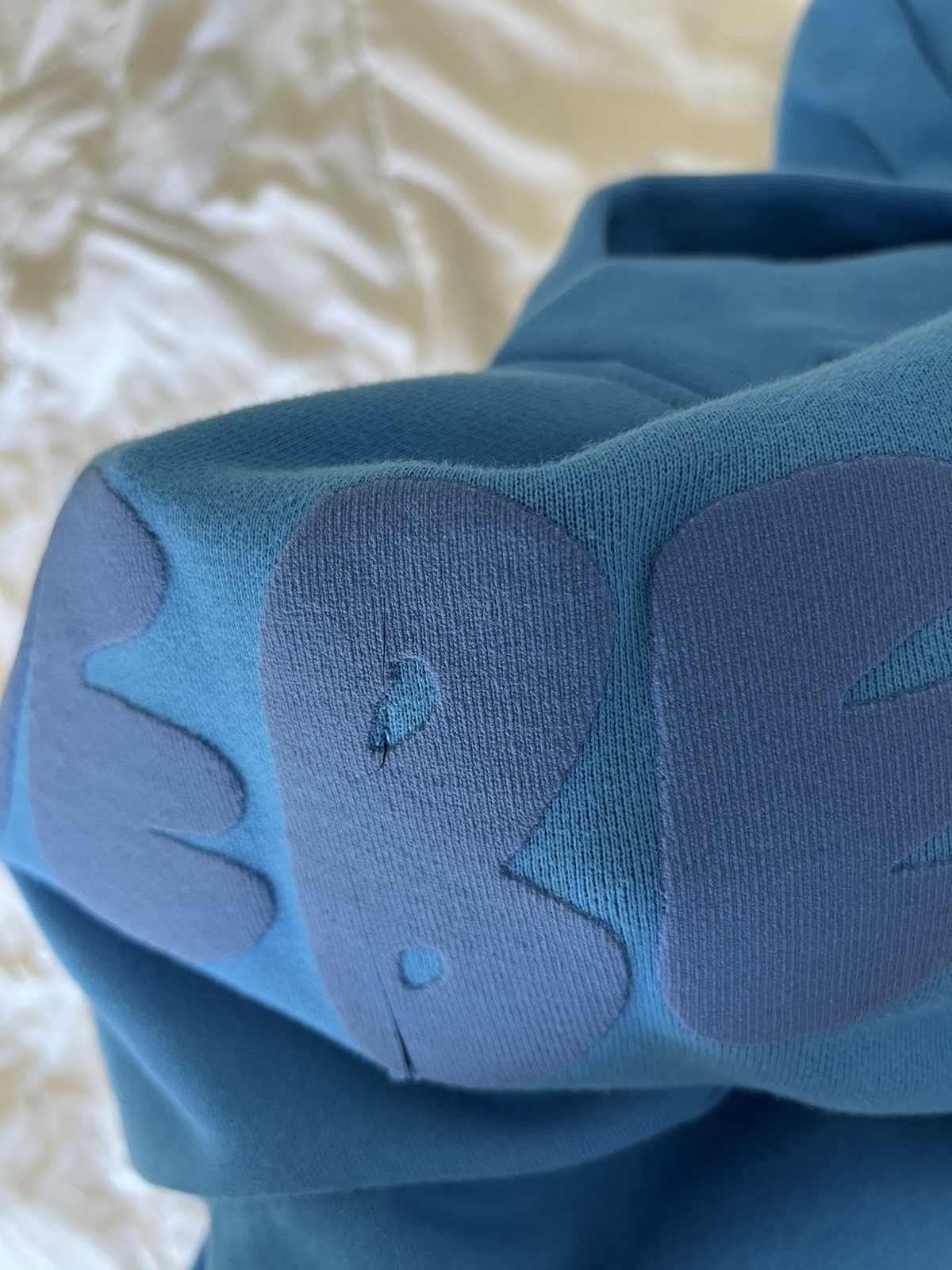 Justin Bieber Official Coachella 2026 Blue Bieber Hoodie Small DAMAGED with Cut gallery