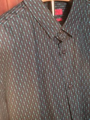 HUGO BOSS branded shirt featuring a distinctive all-over print in black and teal