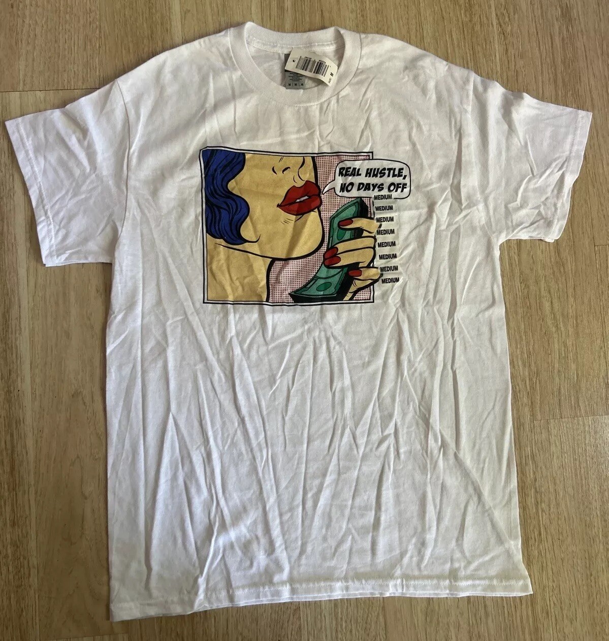 Lichtenstein Style “Real Hustle, No Days Off”Graphic T Medium Comic Graphic New gallery