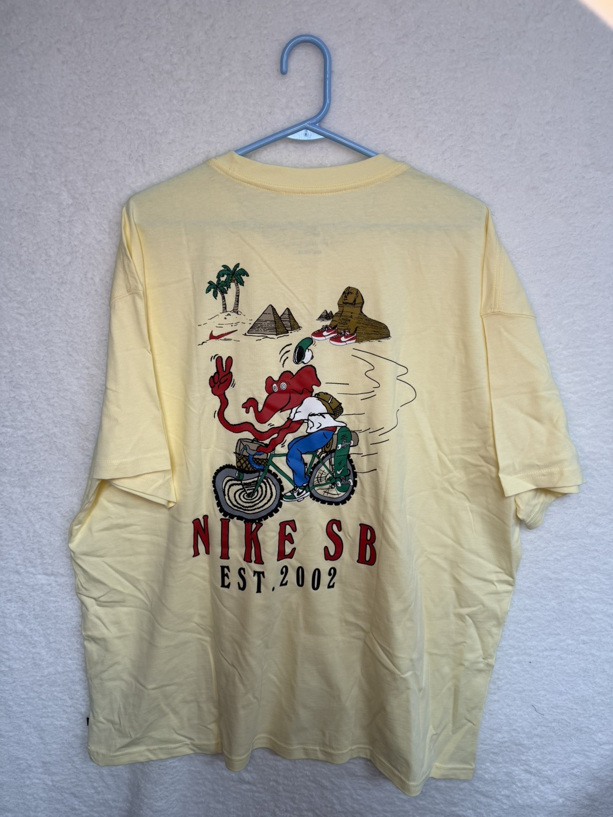 NEW Nike SB Men's T-Shirt Sphinx Bike Pale Vanilla Yellow XL FJ1141-744 NWT gallery