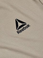 Reebok Men’s Pale Pink Athletic Tee