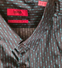 HUGO BOSS branded shirt featuring a distinctive all-over print in black and teal