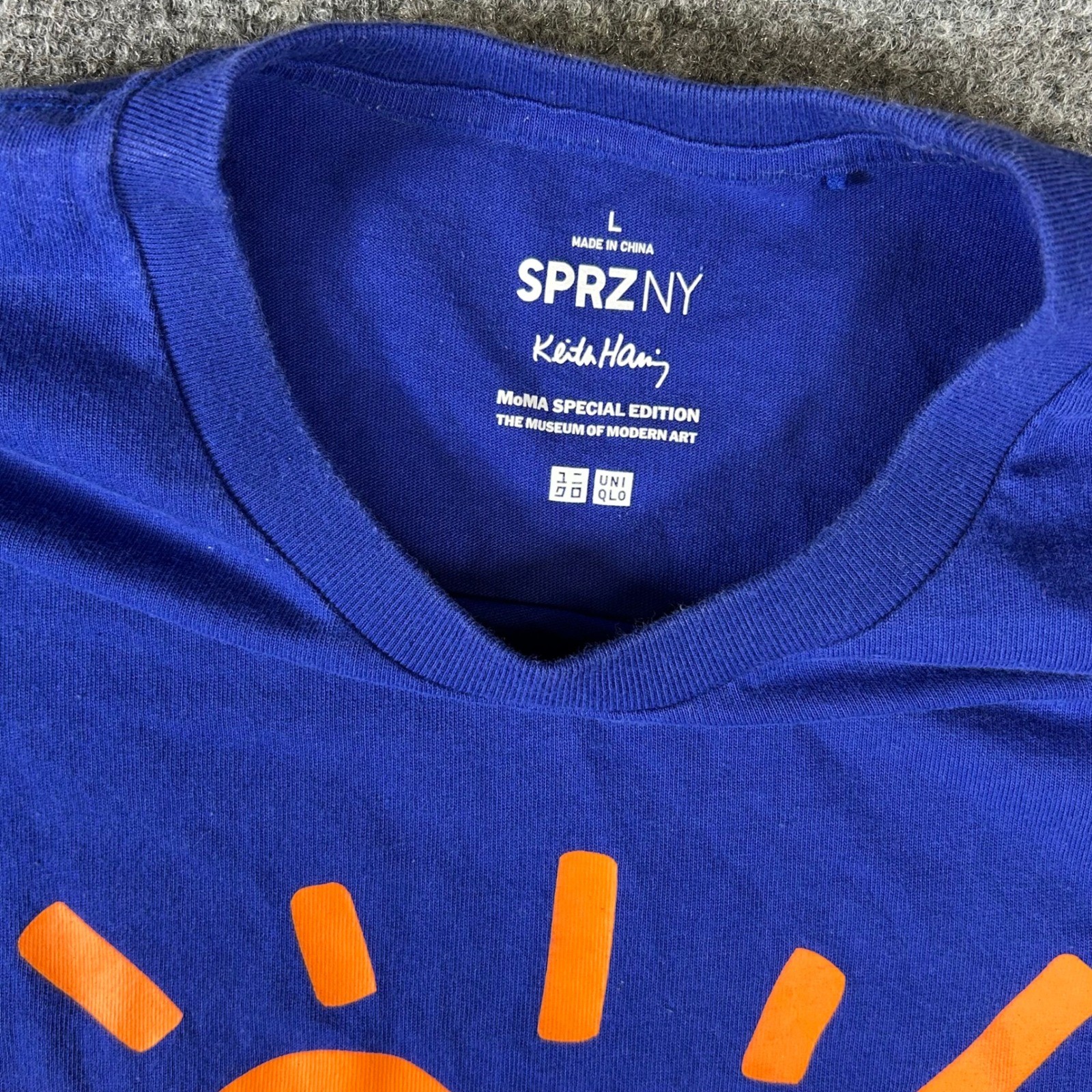 Uniqlo SPRZ NY Keith Haring MoMA Radiant Baby Blue Orange Graphic T-Shirt L gallery