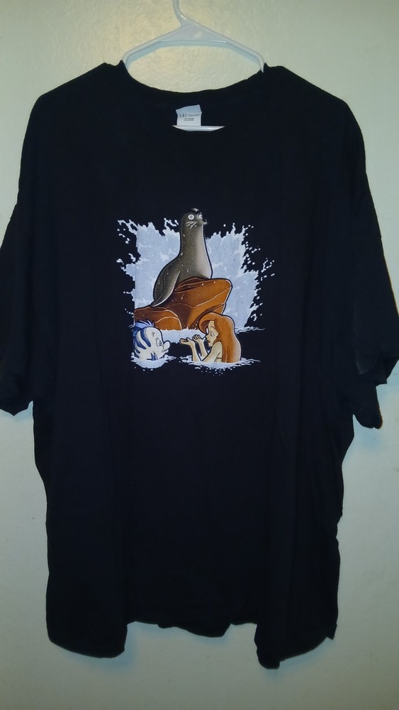 Graphic Tees With Ariel And Gerald On The Rock.