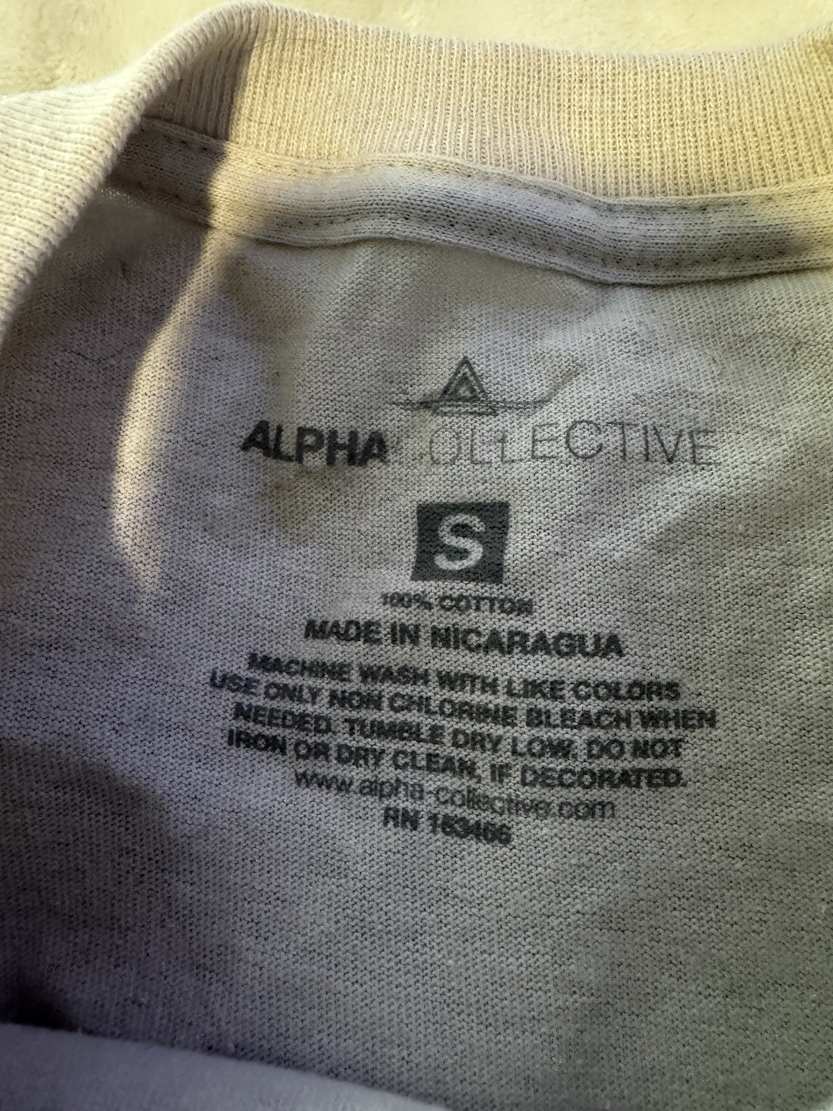 EUC Men’s Alpha Collective Beige Size Small Graphic Print Short Sleeve Shirt gallery