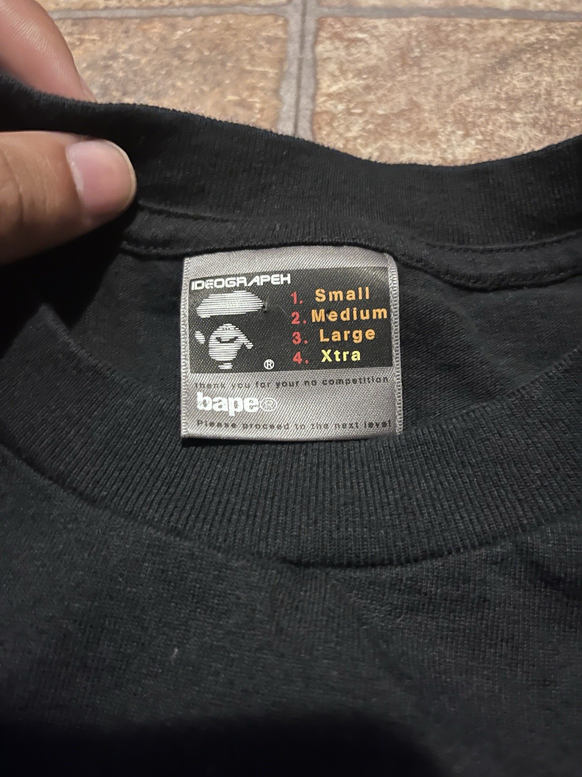 A Bathing Ape BAPE x KAWS Black Logo Graphic Cotton Knit T-Shirt Crew Neck XTRA gallery