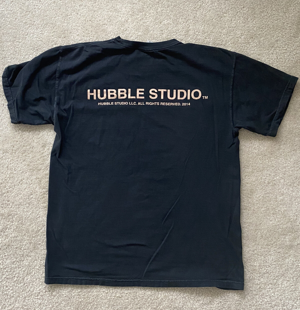 Hubble Studios “Camera Shy” T-Shirt, Black. Sizes Small, Medium, Large