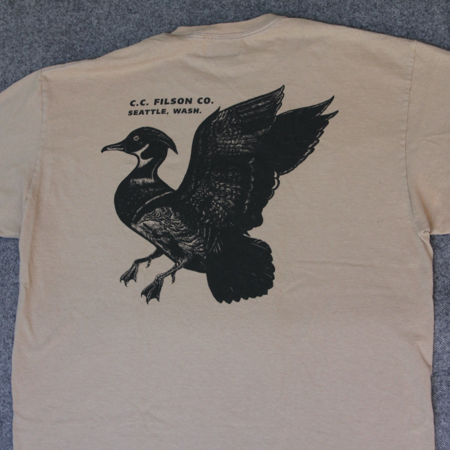 Filson T Shirt XL Tan Flying Duck Bird Art Seattle Washington Graphic Tee