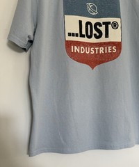 Lost Enterprises Men’s Short Sleeve Tshirt Light Blue W/ Red White And Blue Logo