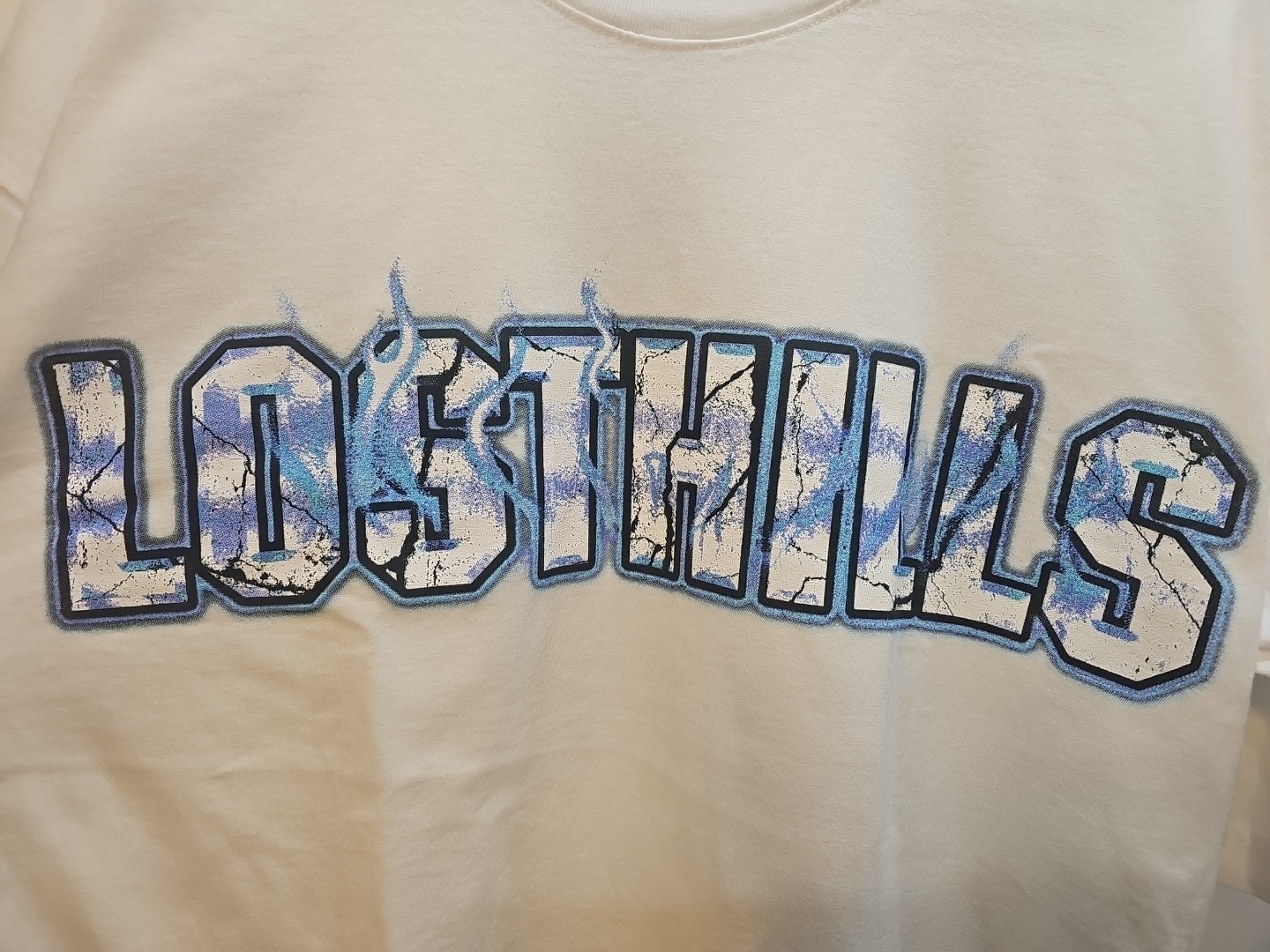 LOST HILLS LOGO FRONT AND MIRROR STYLE LOGO BACK WHITE MEN'S LG (OS) FIRE 🔥 🔥 gallery