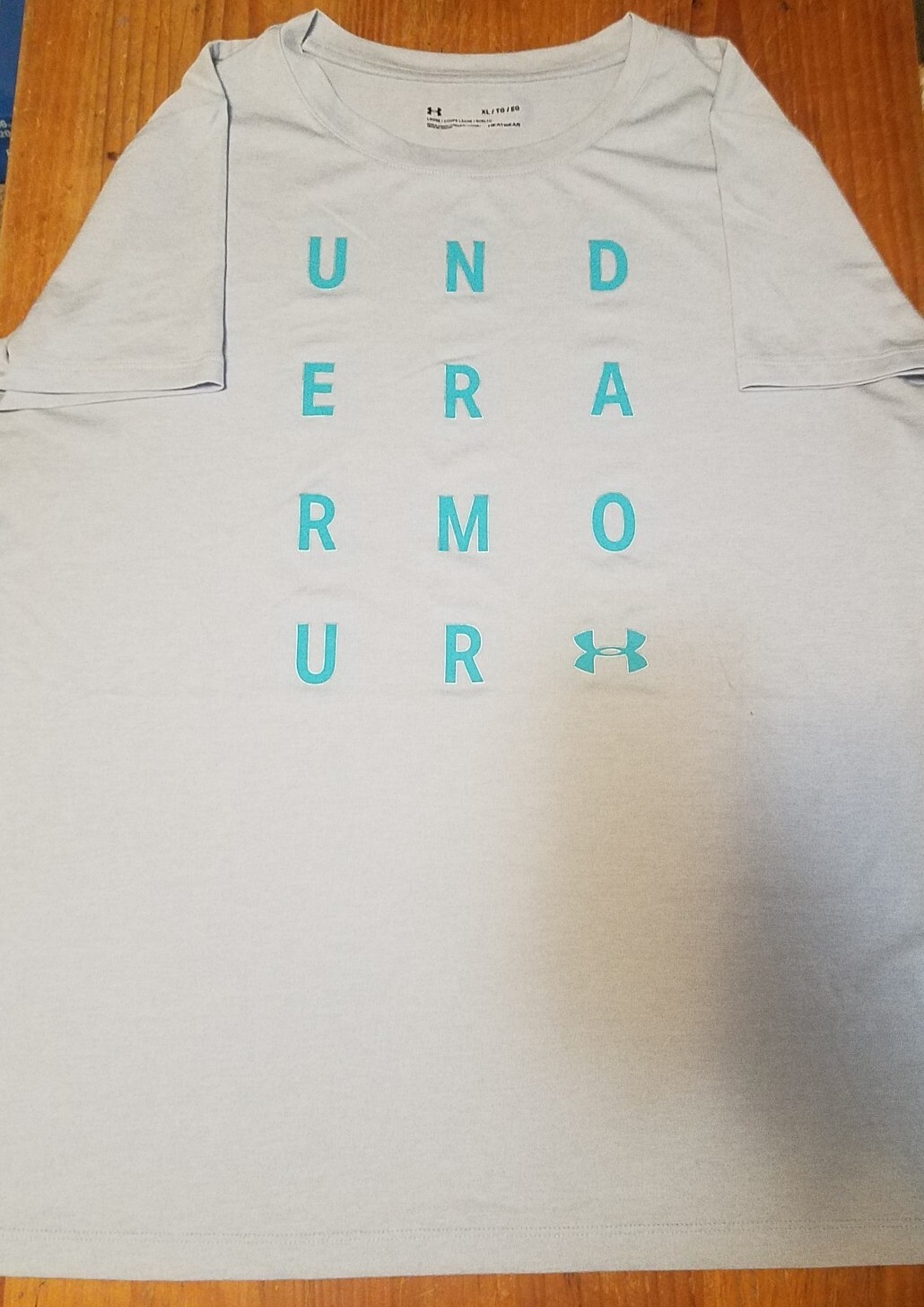🔥Under Armour Men’s Shirt Size XL Light Blue Heat Gear Spell Out