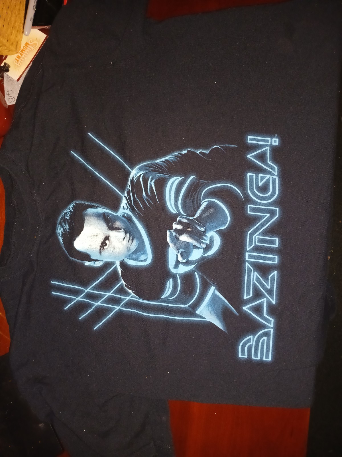 Big Bang Theory - Sheldon Cooper Bazinga! Blue Glow Size XL gallery