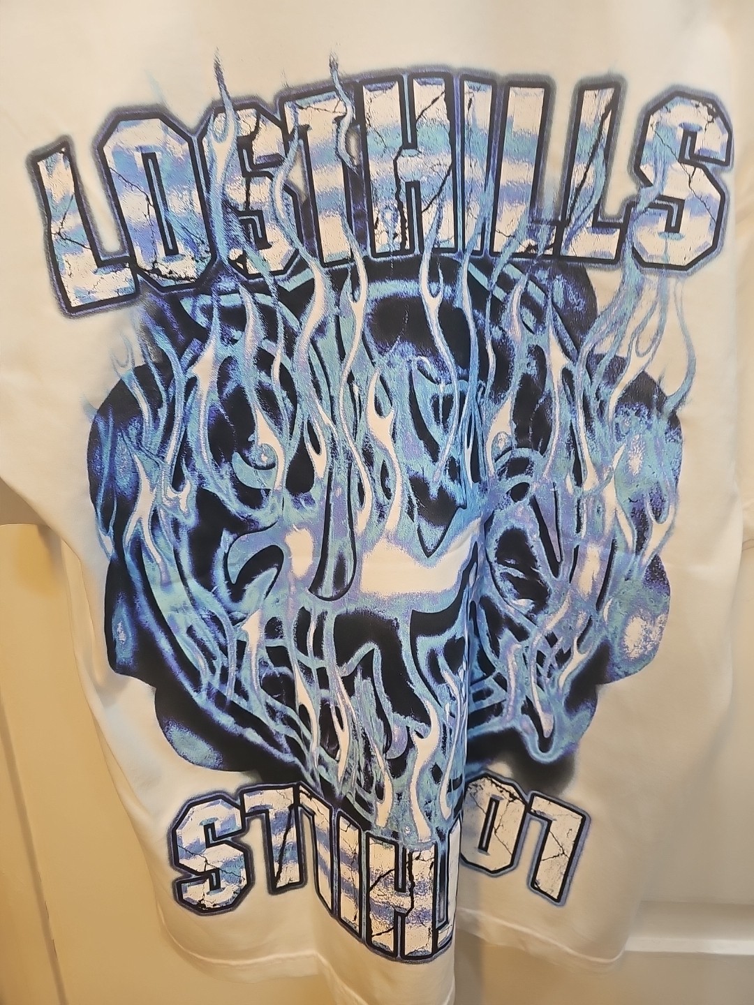 LOST HILLS LOGO FRONT AND MIRROR STYLE LOGO BACK WHITE MEN'S LG (OS) FIRE 🔥 🔥 gallery