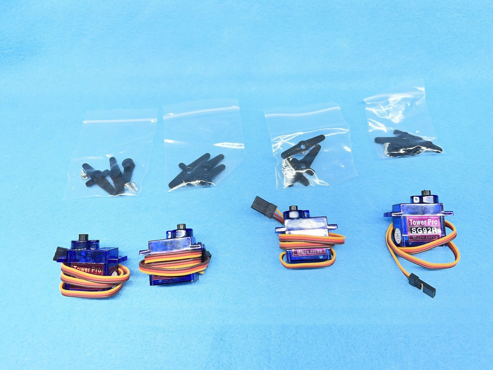 4 Ea. Tower Pro SG92R 9g. Micro Servos with Servo Horns Brand New