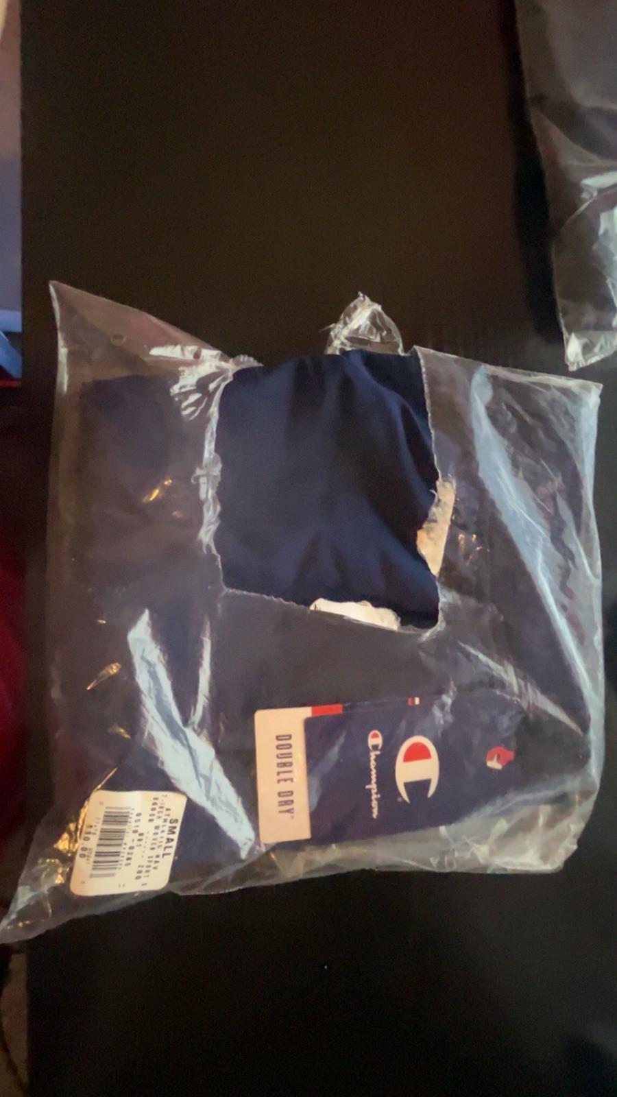 Three champion T-shirts, and one pair of socks gallery