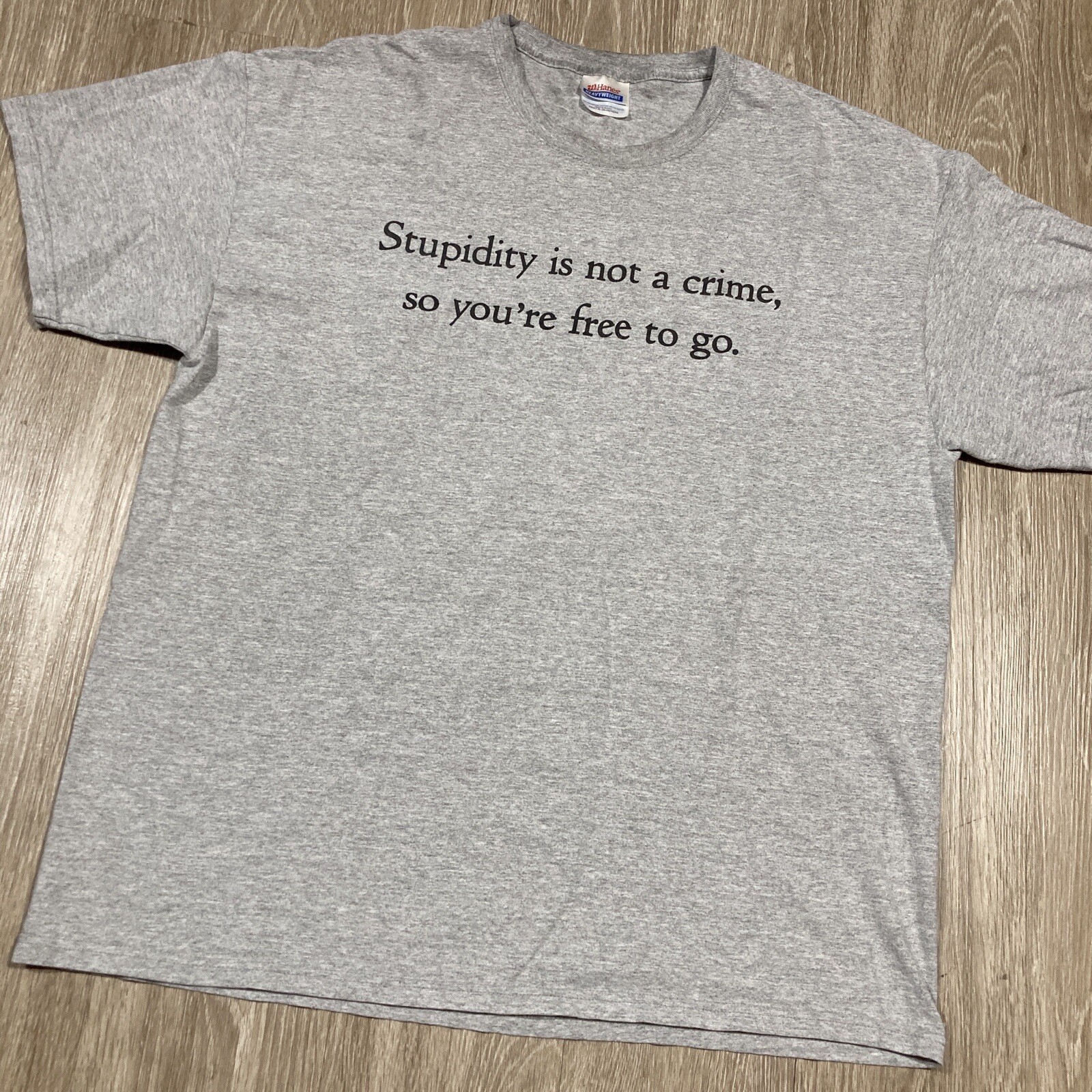 Stupidity Shirt XL 90s 00s Y2k Not A Crime Free To Go Funny Humor Parody Tee gallery