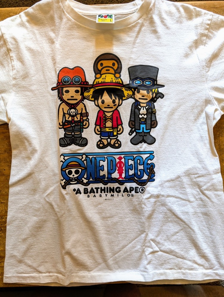 Exclusive Collaboration Bape x One Piece Ace Luffy Sabo Milo Tee Release…