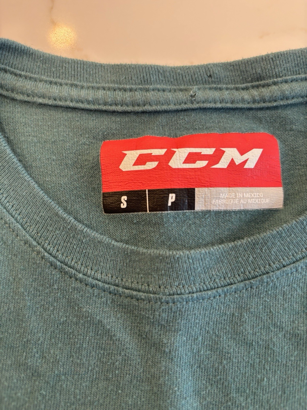 Vintage CCM Hockey T-Shirt Blue/Green 2000s Retro Block Logo Size Small gallery
