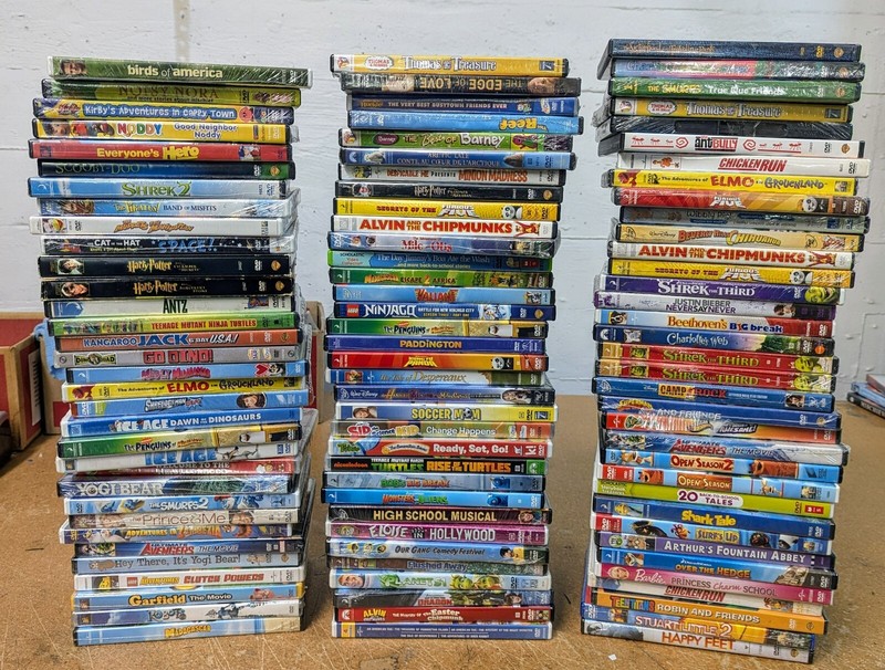Wholesale Kids  Shows, Movies and Educational 100 DVD Lot Count Used Assortment