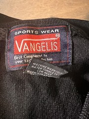 VANGELIS MENS V NECK BLACK PULLOVER SHIRT COLLAR EUC SIZE LARGE ILLUSION SIDES