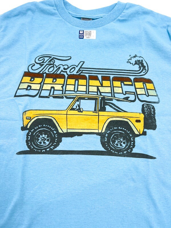 Sky Blue T-Shirt - Yellow Ford Bronco Beach Surfboard Scene w/ Script Emblem gallery
