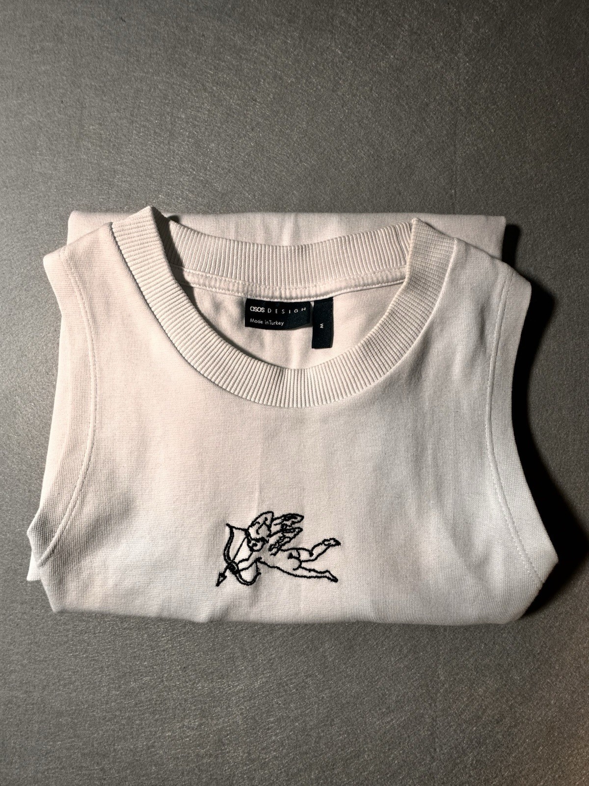 ASOS DESIGN Off White Ribbed Tank Top Cherub Cupid Embroidered Graphic Mens M gallery
