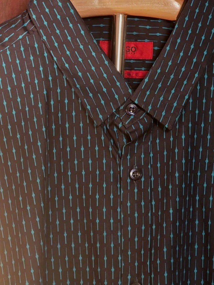 HUGO BOSS branded shirt featuring a distinctive all-over print in black and teal