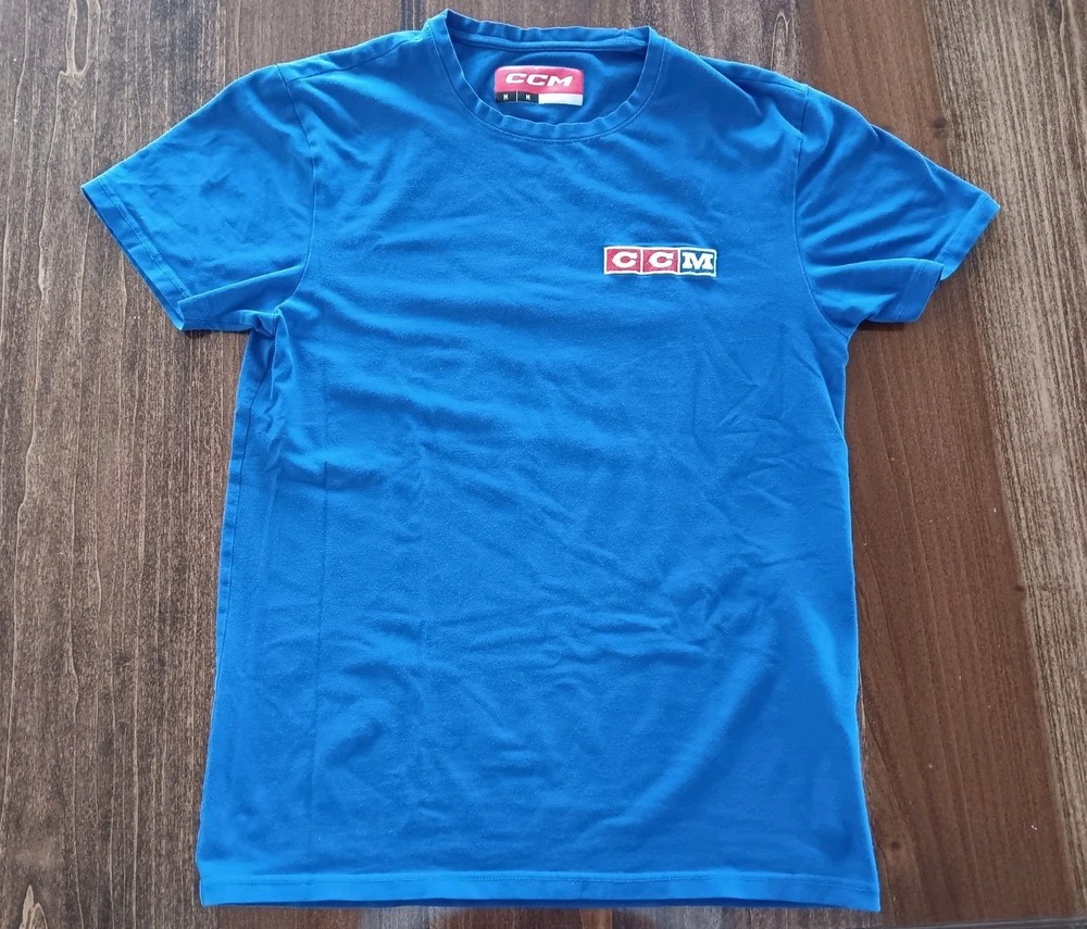 Size Medium CCM with Logo Patch T-Shirt Adult – Fits Small – 95% Cotton