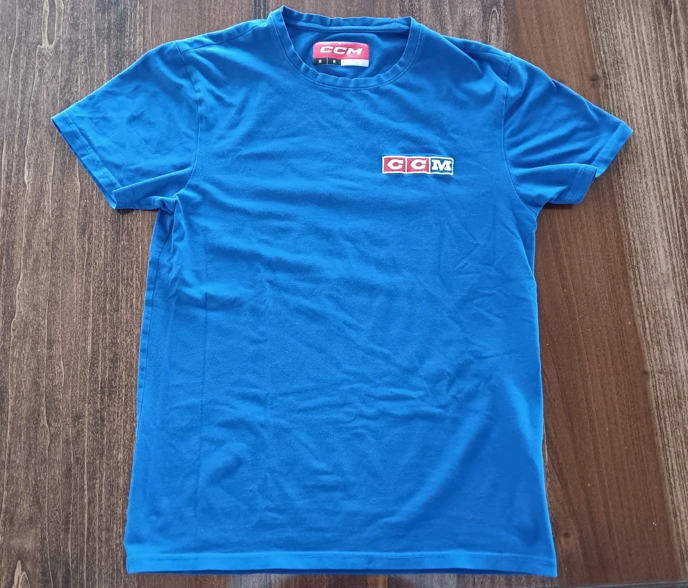 Size Medium CCM with Logo Patch T-Shirt Adult – Fits Small – 95% Cotton