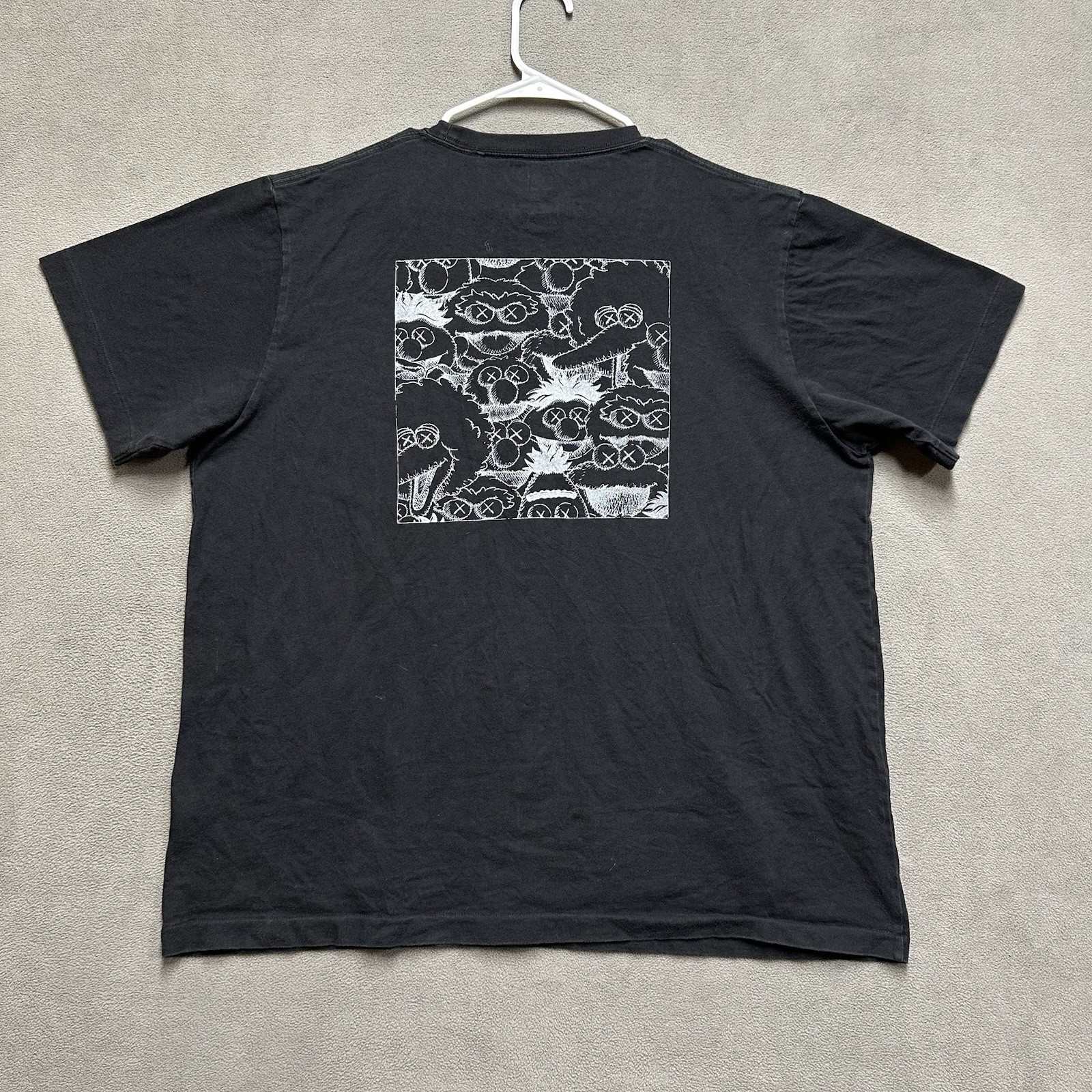 Uniqlo UT KAWS Sesame Street Shirt Mens XL Black Graphic Print Casual Pocket Tee gallery