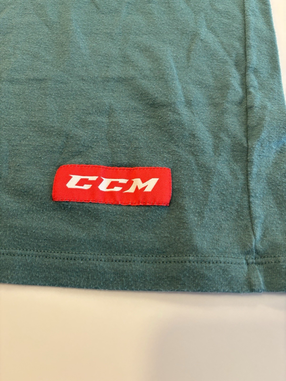Vintage CCM Hockey T-Shirt Blue/Green 2000s Retro Block Logo Size Small gallery