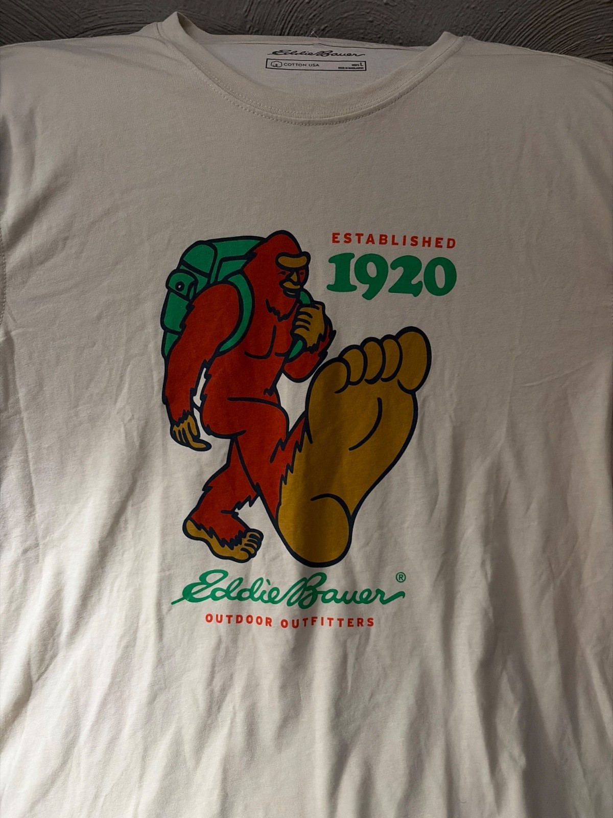 Eddie Bauer Sasquatch t-shirt features a red bigfoot graphic with a g gallery