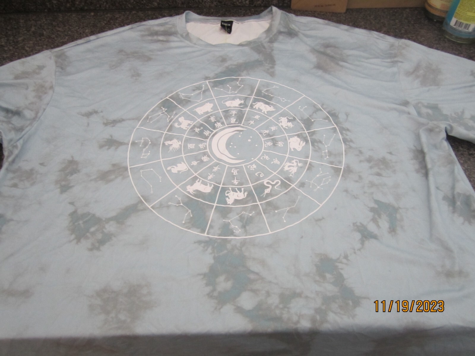 Shein T-Shirt – Blue – Large – “Zodiac” – 95% Poly, 5% Spandex