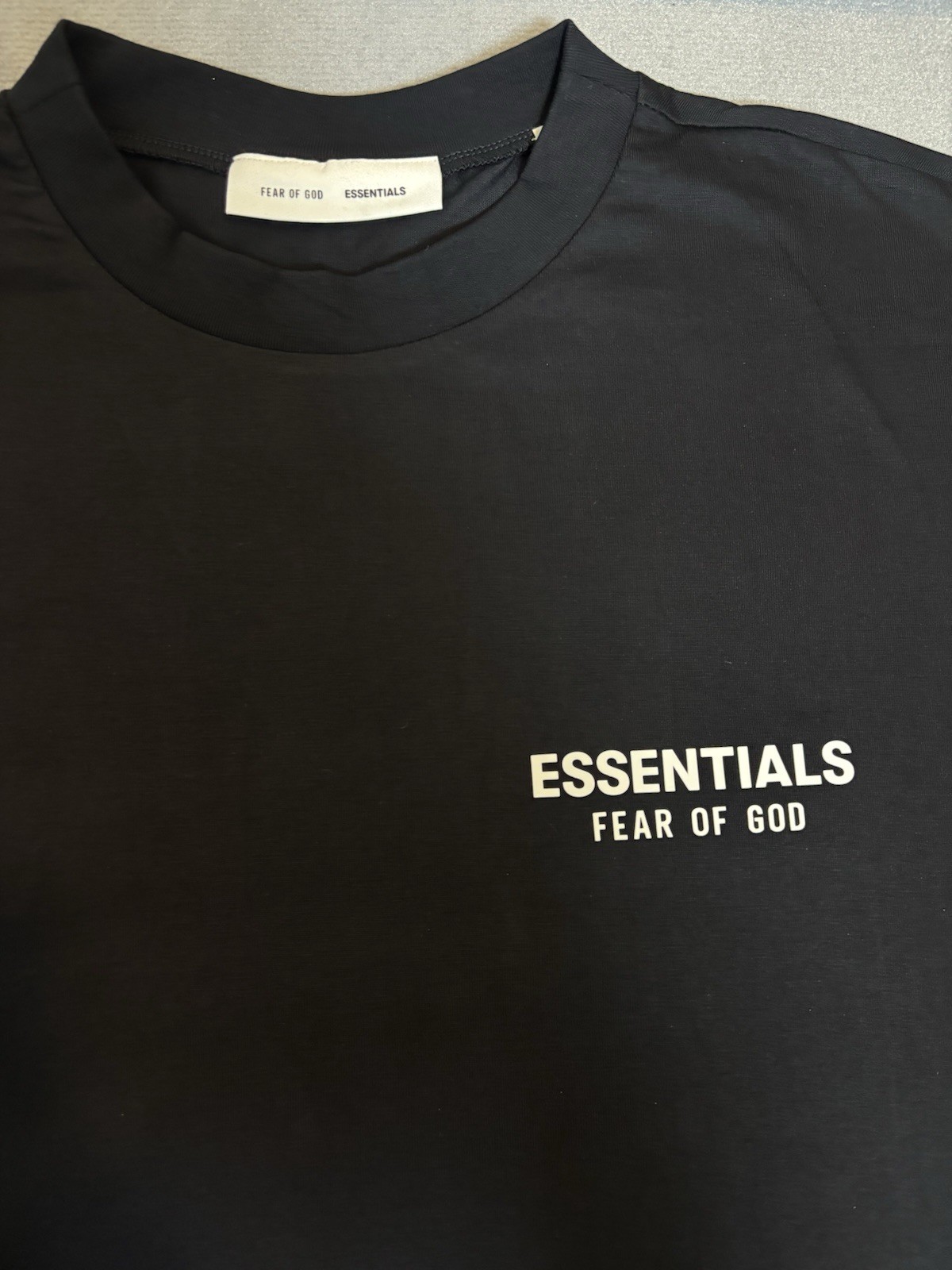 Fear of God ESSENTIALS Men's M Black Logo Graphic Crew Neck Short Sleeve Tee gallery