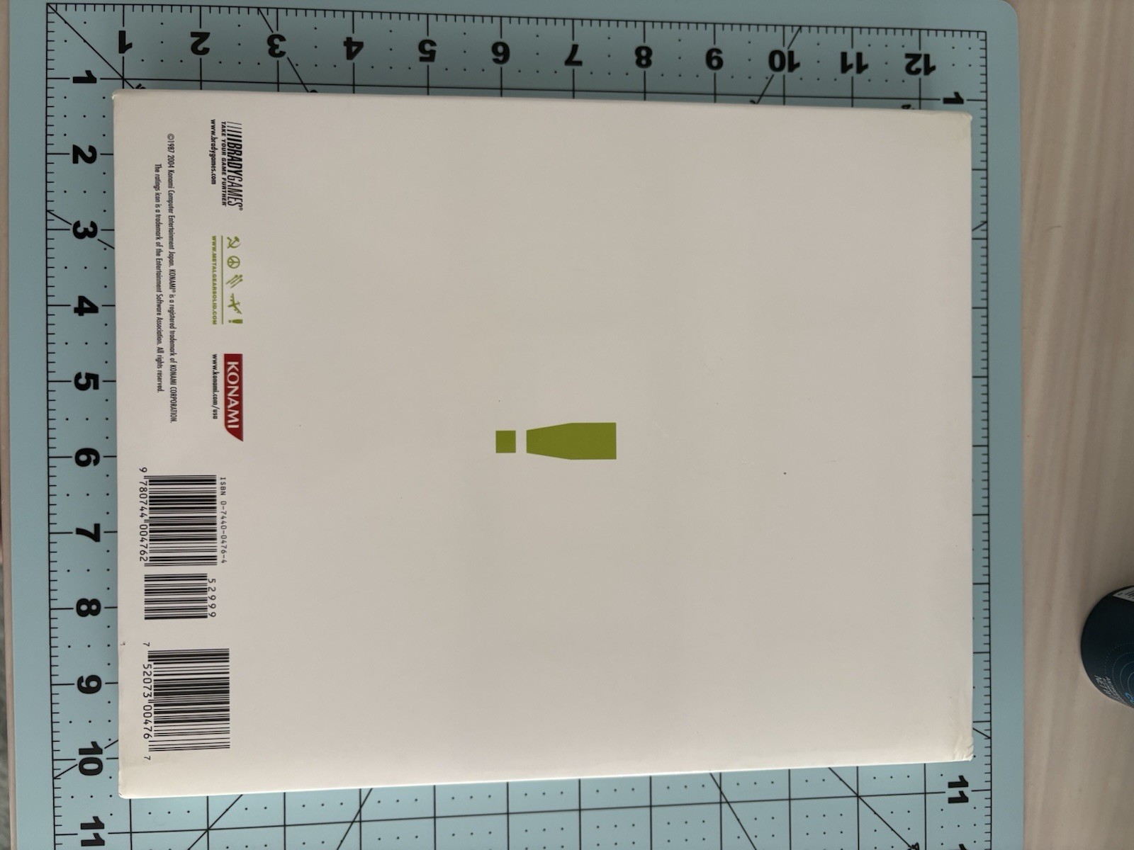 Metal Gear Solid collector lot with Uniqlo 25th Anniversary shirt gallery
