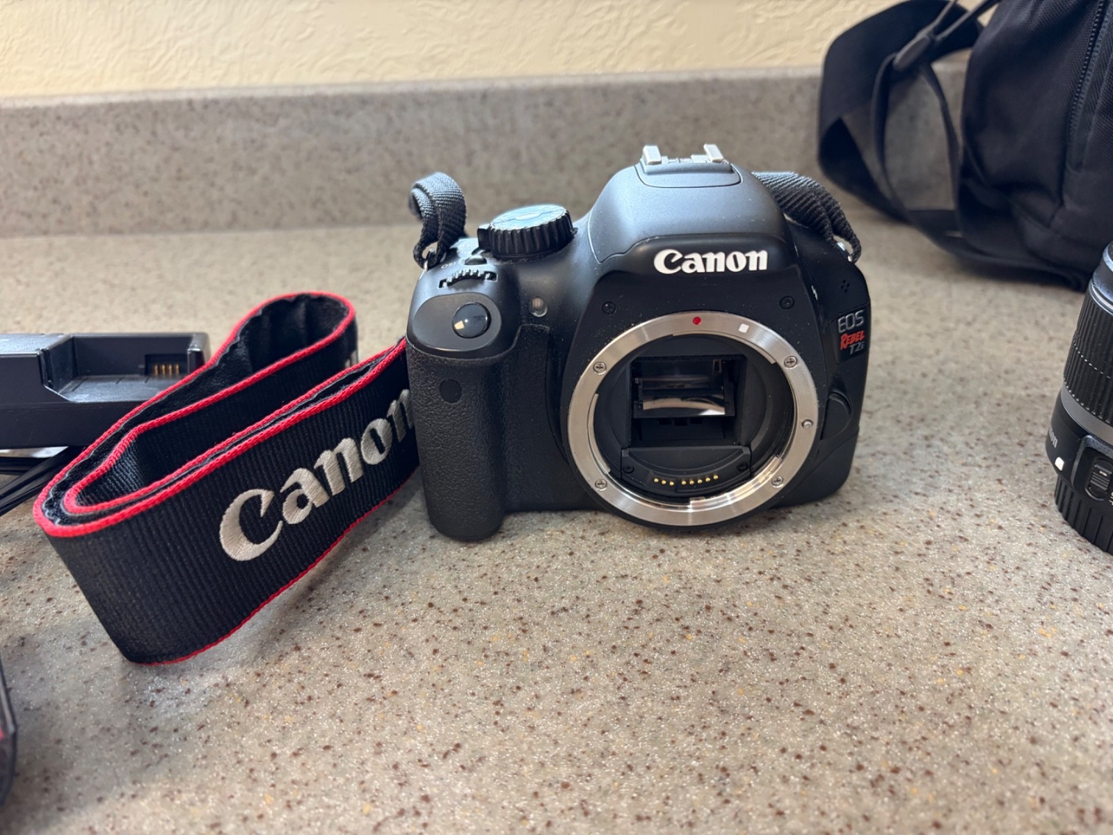 Canon EOS Rebel T2i 18MP DSLR Camera With Accessories